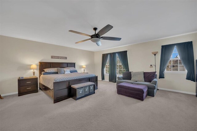 1002 Brook Mont Dr, Ofallon, MO 63366 - bedroom with light carpet, baseboards, and a ceiling fan