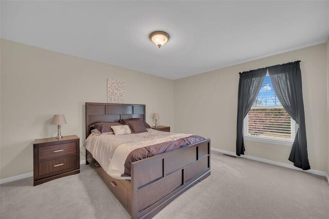 1002 Brook Mont Dr, Ofallon, MO 63366 - bedroom featuring light colored carpet and baseboards
