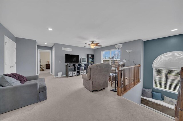 1002 Brook Mont Dr, Ofallon, MO 63366 - living area with carpet flooring, a ceiling fan, recessed lighting, and baseboards