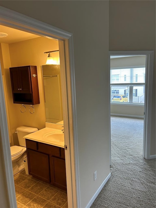 333 Bramblett Hls, Ofallon, MO 63366 - bathroom featuring vanity, toilet, and baseboards