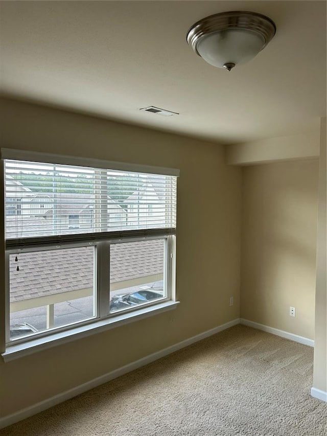 333 Bramblett Hls, Ofallon, MO 63366 - spare room featuring baseboards and carpet