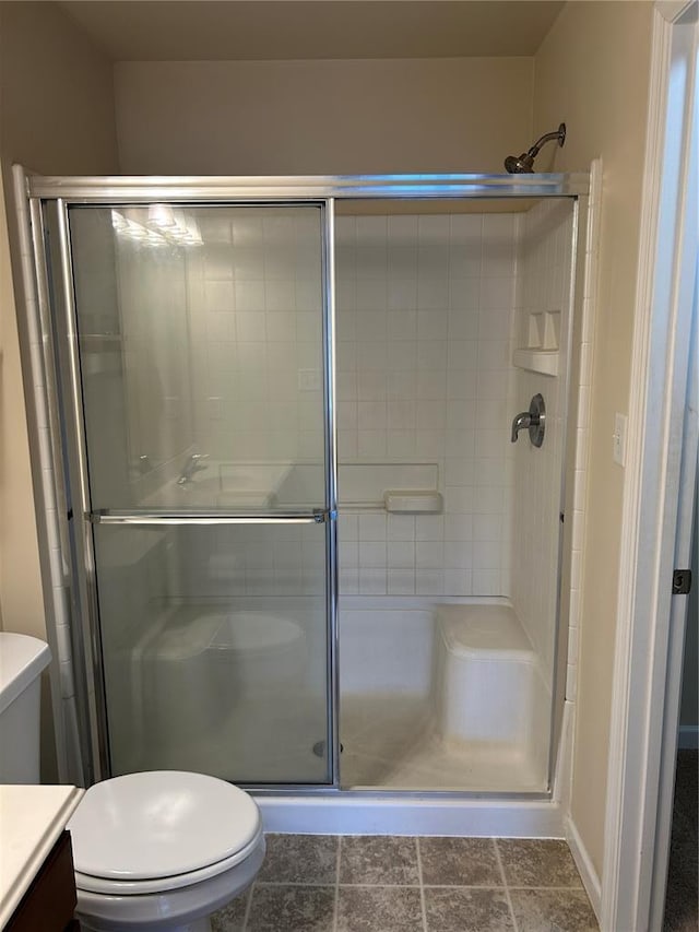 333 Bramblett Hls, Ofallon, MO 63366 - bathroom featuring toilet, vanity, and a stall shower