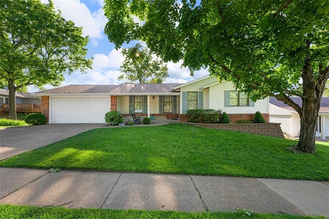 5812 Birch Hollow Dr, Oakville, MO 63129 - ranch-style house featuring brick siding, a garage, a front yard, and concrete driveway