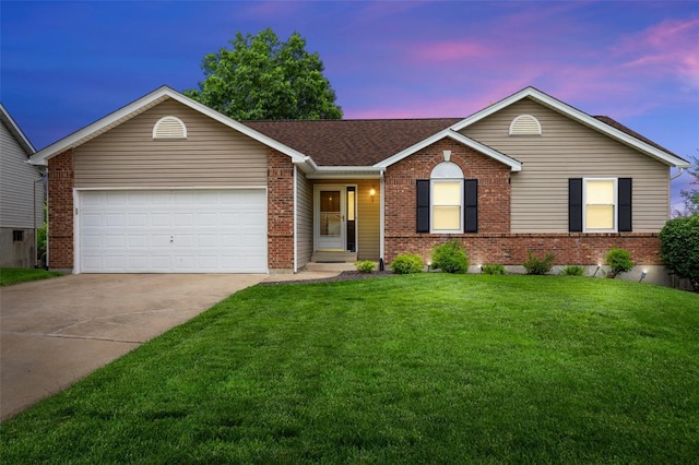 30 Fawn View Ln, Ofallon, MO 63366 - ranch-style house with brick siding, concrete driveway, a front yard, a garage, and roof with shingles
