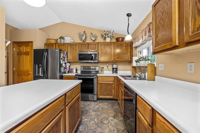 30 Fawn View Ln, Ofallon, MO 63366 - kitchen featuring stainless steel appliances, a sink, brown cabinets, stone finish flooring, and light countertops