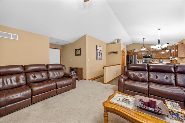 30 Fawn View Ln, Ofallon, MO 63366 - living area featuring light colored carpet, vaulted ceiling, and baseboards