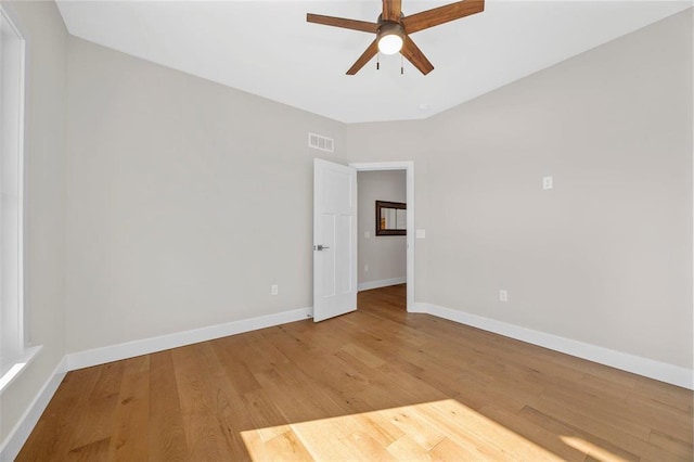 973 Buckner Rd, Wentzville, MO 63385 - empty room featuring a ceiling fan, wood finished floors, and baseboards