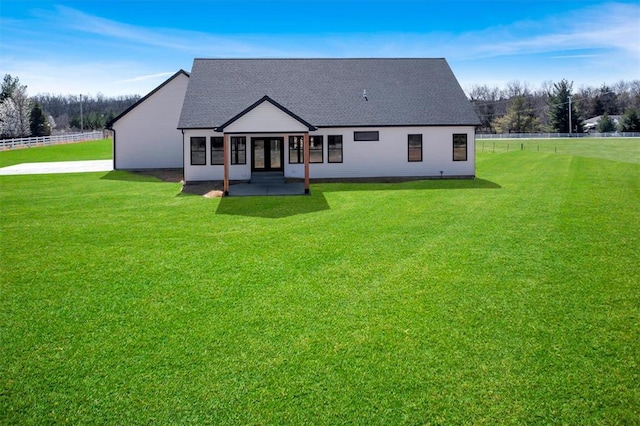 973 Buckner Rd, Wentzville, MO 63385 - back of property with french doors and a shingled roof