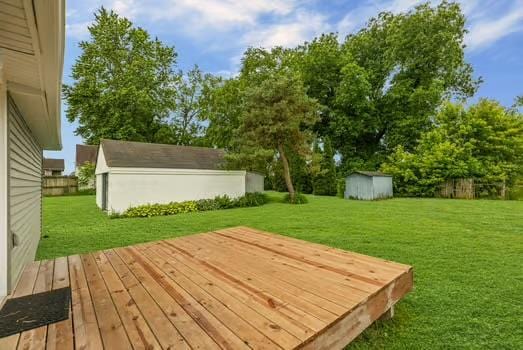 121 Douglas St, Ofallon, IL 62269 - deck featuring a lawn