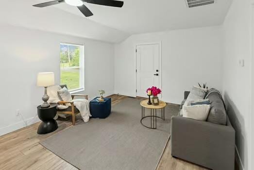 121 Douglas St, Ofallon, IL 62269 - living area with wood finished floors, a ceiling fan, lofted ceiling, and baseboards