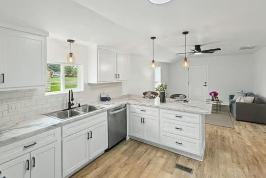 121 Douglas St, Ofallon, IL 62269 - kitchen with dishwasher, a sink, a peninsula, white cabinetry, and a ceiling fan