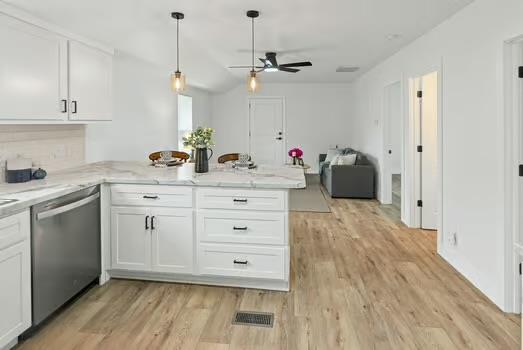 121 Douglas St, Ofallon, IL 62269 - kitchen featuring dishwasher, a peninsula, a ceiling fan, white cabinets, and light wood-style floors