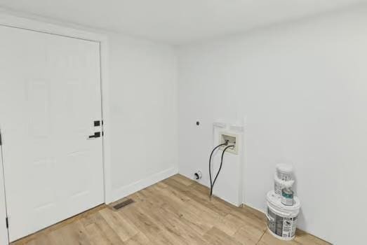 121 Douglas St, Ofallon, IL 62269 - washroom with hookup for an electric dryer, hookup for a washing machine, and light wood-style floors