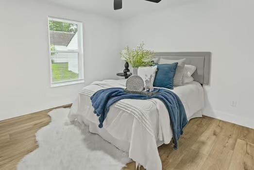 121 Douglas St, Ofallon, IL 62269 - bedroom featuring wood finished floors and ceiling fan