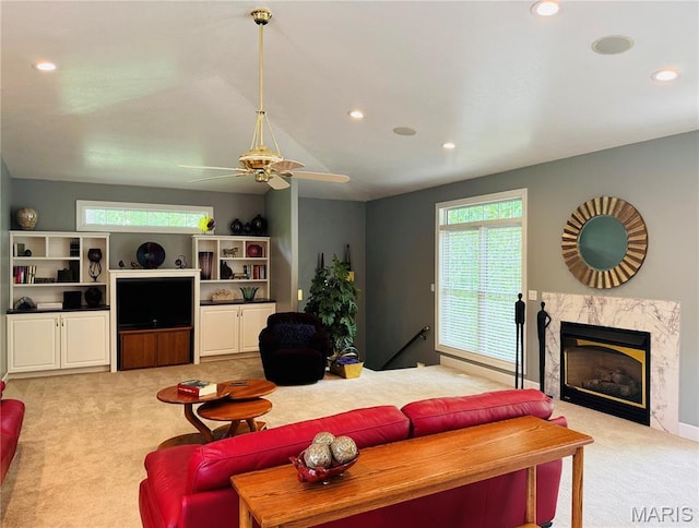 2700 Hyacinth Ave, Hannibal, MO 63401 - living room with light carpet, recessed lighting, ceiling fan, and a high end fireplace