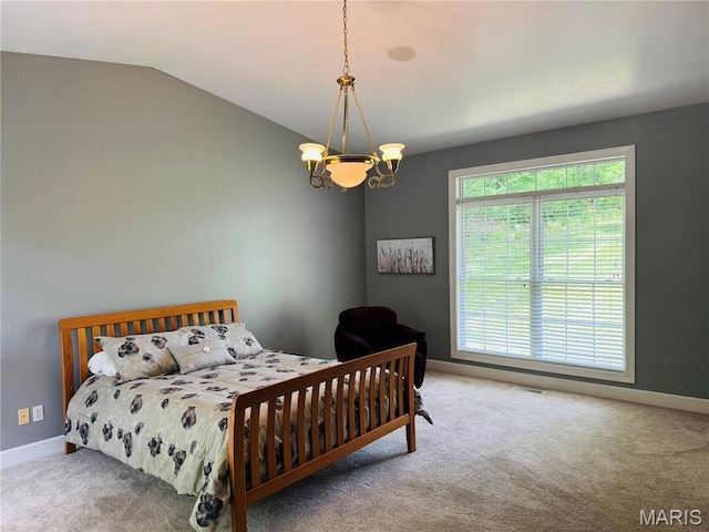 2700 Hyacinth Ave, Hannibal, MO 63401 - carpeted bedroom with a chandelier, baseboards, and vaulted ceiling