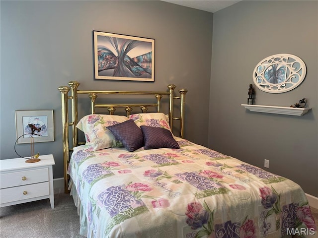 2700 Hyacinth Ave, Hannibal, MO 63401 - bedroom with carpet flooring and baseboards