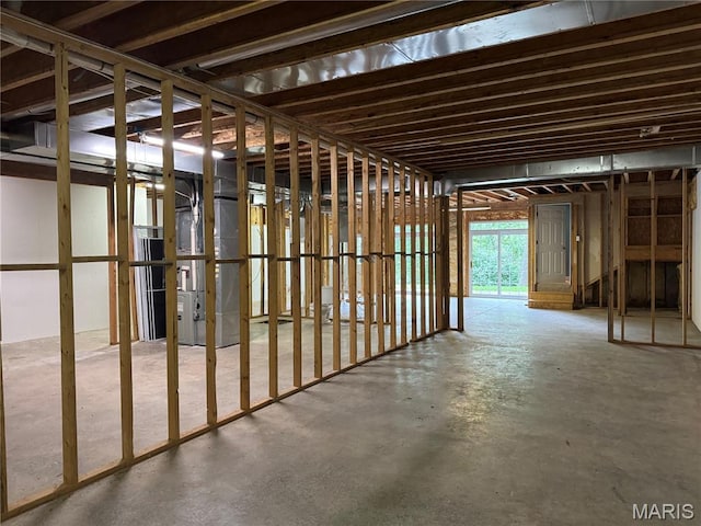 2700 Hyacinth Ave, Hannibal, MO 63401 - miscellaneous room featuring heating unit and concrete floors