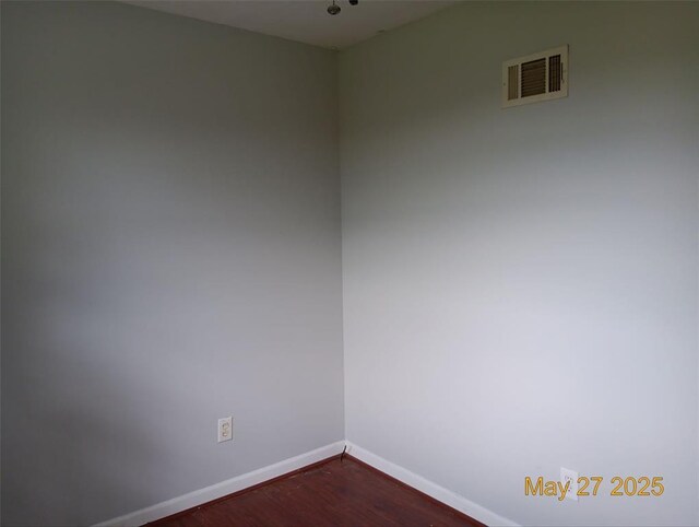 3734 Carol Park Rd, House Springs, MO 63051 - empty room with baseboards and dark wood-type flooring