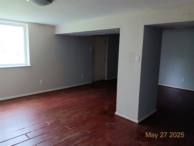 3734 Carol Park Rd, House Springs, MO 63051 - spare room with wood-type flooring and baseboards