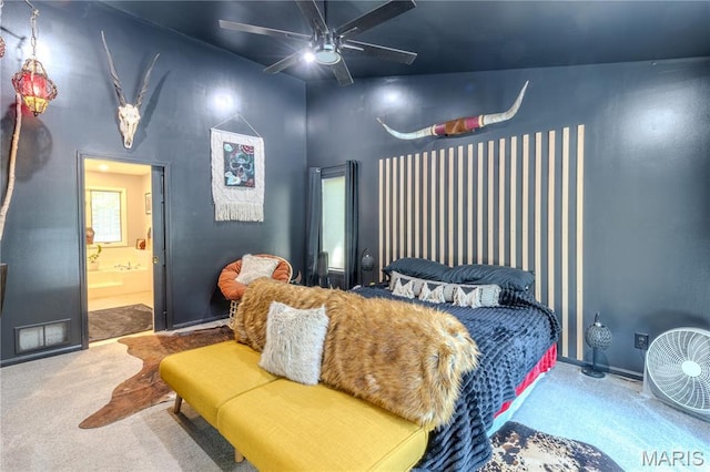 700 Lariat Ln, Rolla, MO 65401 - bedroom featuring carpet flooring, ensuite bathroom, a towering ceiling, and ceiling fan