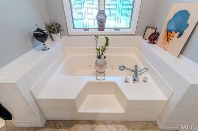 700 Lariat Ln, Rolla, MO 65401 - full bath featuring a tub with jets and tile patterned flooring