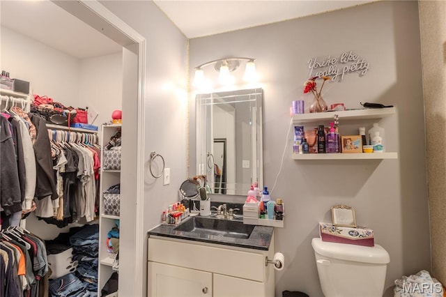 700 Lariat Ln, Rolla, MO 65401 - bathroom featuring vanity and toilet