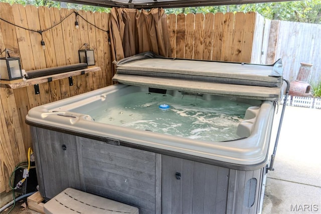 700 Lariat Ln, Rolla, MO 65401 - view of patio with a hot tub