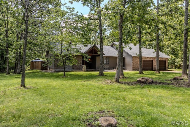 700 Lariat Ln, Rolla, MO 65401 - view of front of house with a front yard and roof with shingles