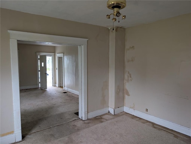 115 W Maple St, Gillespie, IL 62033 - unfurnished room featuring light carpet and baseboards