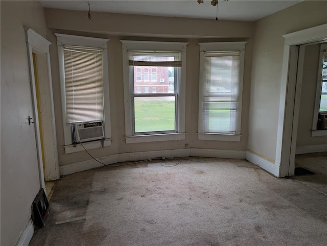 115 W Maple St, Gillespie, IL 62033 - carpeted spare room with baseboards and cooling unit