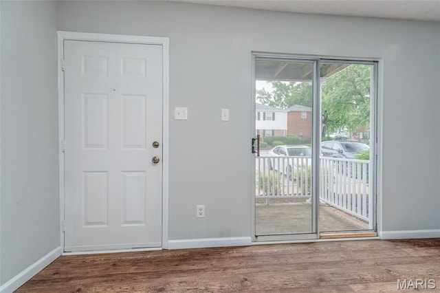 1447 Oriole Pl, Brentwood, MO 63144 - entrance foyer featuring wood finished floors and baseboards