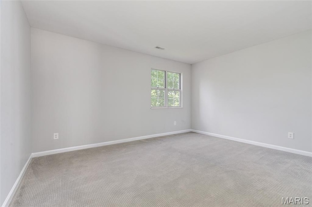 1447 Oriole Pl, Brentwood, MO 63144 - carpeted empty room with baseboards