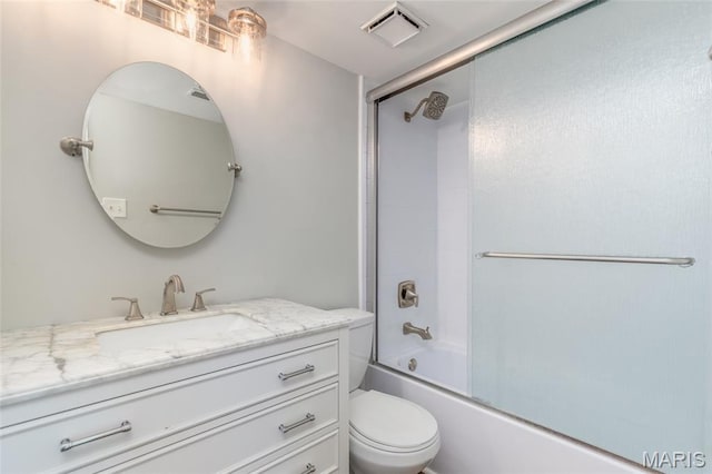 1447 Oriole Pl, Brentwood, MO 63144 - bathroom with vanity, toilet, and combined bath / shower with glass door