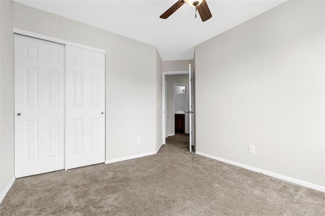 904 Hunter Ln, Lake St Louis, MO 63367 - unfurnished bedroom featuring carpet flooring, baseboards, a closet, and ceiling fan