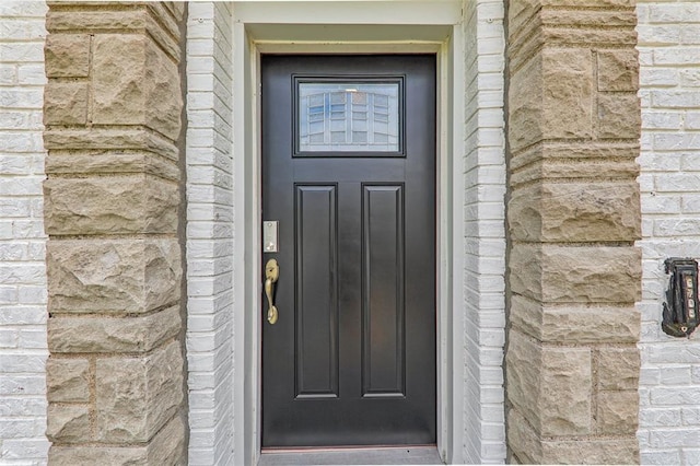 6708 Etzel Ave, University City, MO 63130 - property entrance featuring stone siding and brick siding