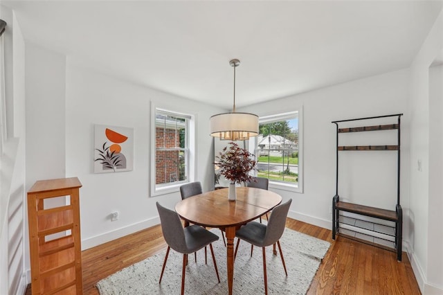 6708 Etzel Ave, University City, MO 63130 - dining space featuring wood finished floors and baseboards