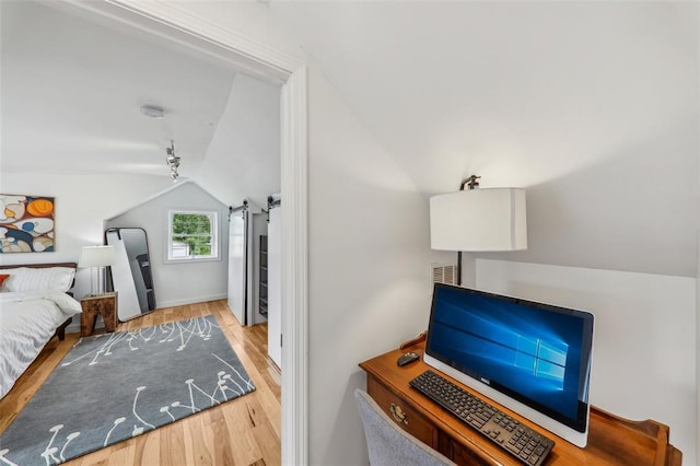 6708 Etzel Ave, University City, MO 63130 - bedroom with lofted ceiling and wood finished floors