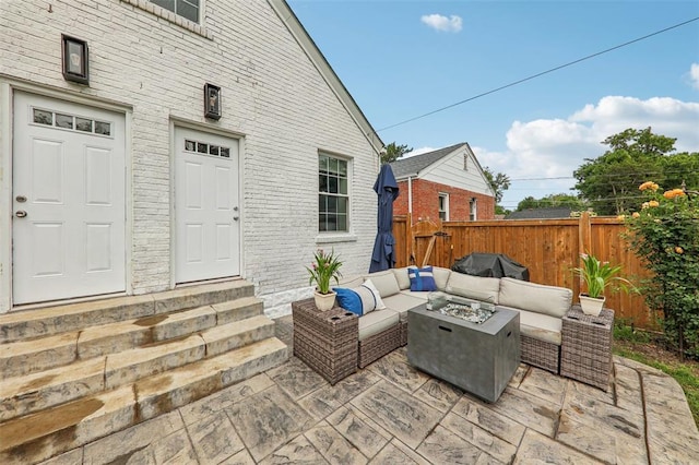 6708 Etzel Ave, University City, MO 63130 - view of patio featuring entry steps, an outdoor living space with a fire pit, and a grill