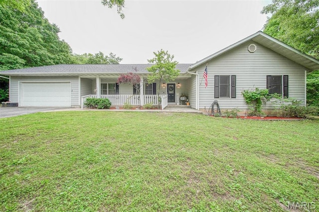 1708 Line Ave, Rolla, MO 65401 - ranch-style home featuring a porch, a garage, driveway, and a front lawn
