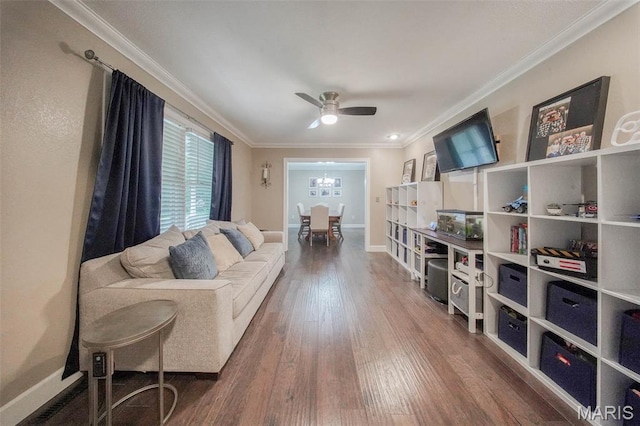 1708 Line Ave, Rolla, MO 65401 - living area featuring wood finished floors, ornamental molding, a ceiling fan, and baseboards
