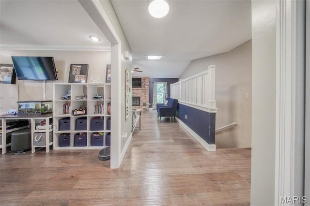 1708 Line Ave, Rolla, MO 65401 - corridor featuring wood finished floors, vaulted ceiling, baseboards, and ornamental molding