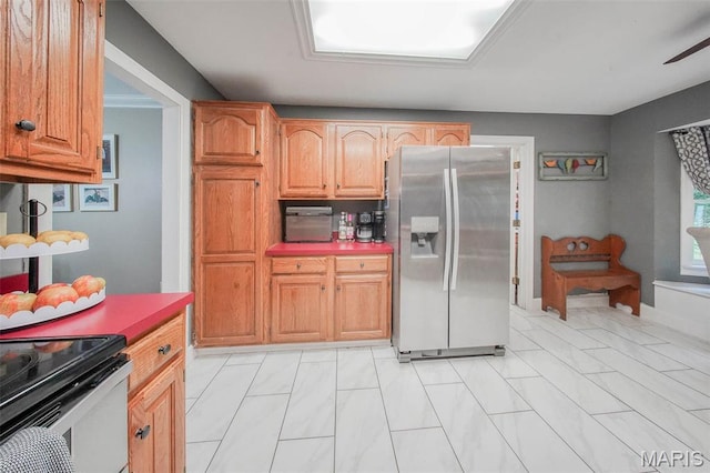 1708 Line Ave, Rolla, MO 65401 - kitchen with appliances with stainless steel finishes, light marble finish floors, and ceiling fan