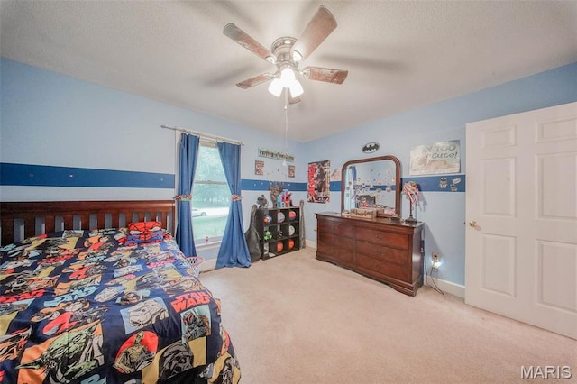 1708 Line Ave, Rolla, MO 65401 - carpeted bedroom featuring a textured ceiling, ceiling fan, and baseboards