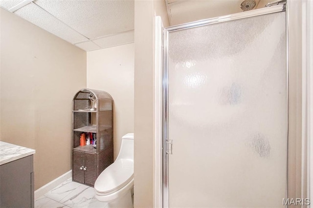1708 Line Ave, Rolla, MO 65401 - bathroom featuring a stall shower, toilet, marble finish flooring, baseboards, and vanity