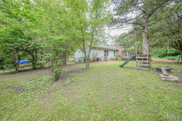 1708 Line Ave, Rolla, MO 65401 - view of grassy yard with a playground