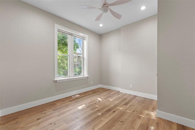 3535 Giles Ave, Saint Louis, MO 63116 - empty room with baseboards, light wood finished floors, ceiling fan, and recessed lighting
