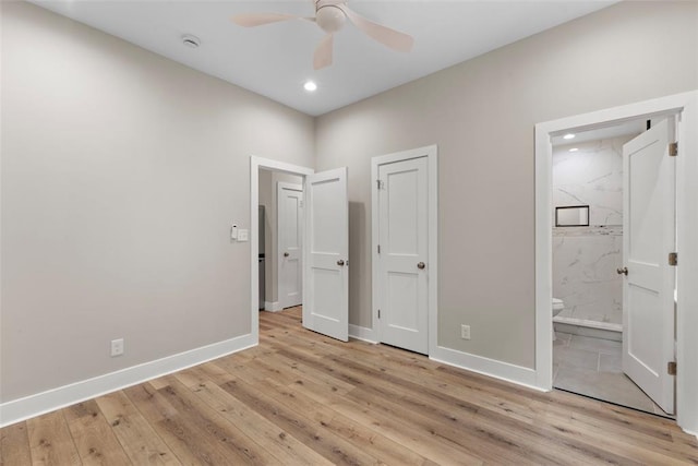 3535 Giles Ave, Saint Louis, MO 63116 - unfurnished bedroom with light wood-style floors, baseboards, recessed lighting, connected bathroom, and ceiling fan
