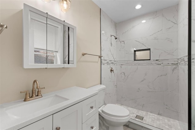 3535 Giles Ave, Saint Louis, MO 63116 - full bath featuring vanity, toilet, a marble finish shower, and recessed lighting