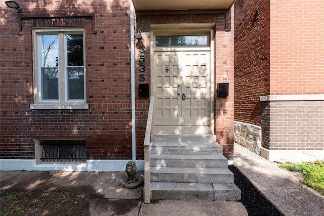 3535 Giles Ave, Saint Louis, MO 63116 - doorway to property featuring brick siding